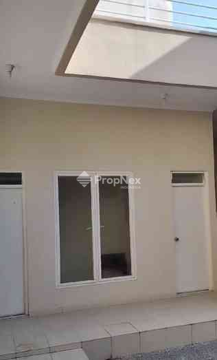 Rumah Minimalis Dharmahusada Indah Utara — foto 8